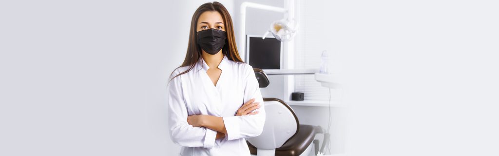 A dentist wearing mask